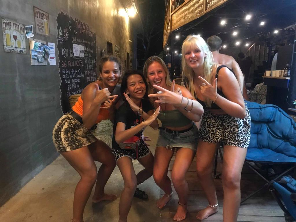 a group of girls posing for a picture together at Big Paul Hostel in El Nido