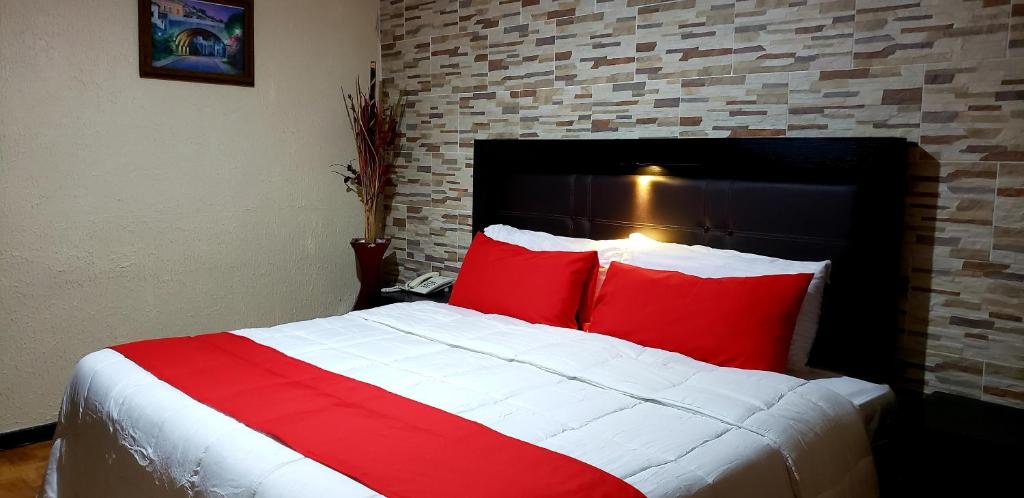 Postel nebo postele na pokoji v ubytování Hotel Murillo Plaza