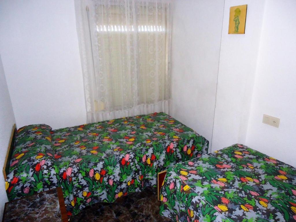 A bed or beds in a room at Les Doyes Bl 5 3-73 LEK