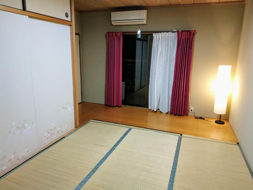 Letto o letti in una camera di Yufuin Sunday