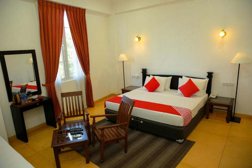 Postel nebo postele na pokoji v ubytování Glenloch Tea Factory Hotel