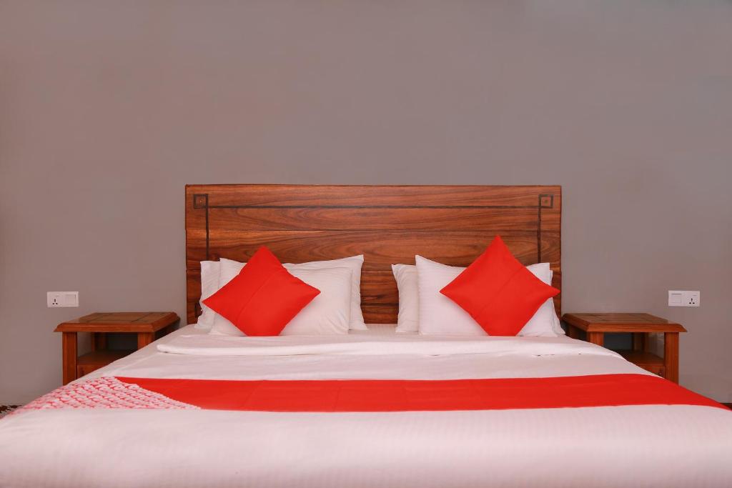 Postel nebo postele na pokoji v ubytování OYO 278 Hotel Rivelka