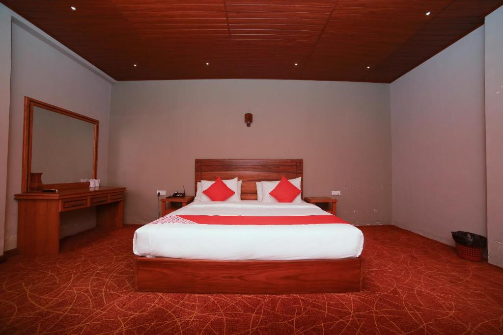 Postel nebo postele na pokoji v ubytování OYO 278 Hotel Rivelka