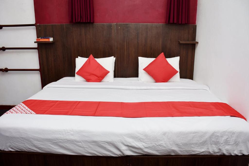Voodi või voodid majutusasutuse Roshan Guest House toas