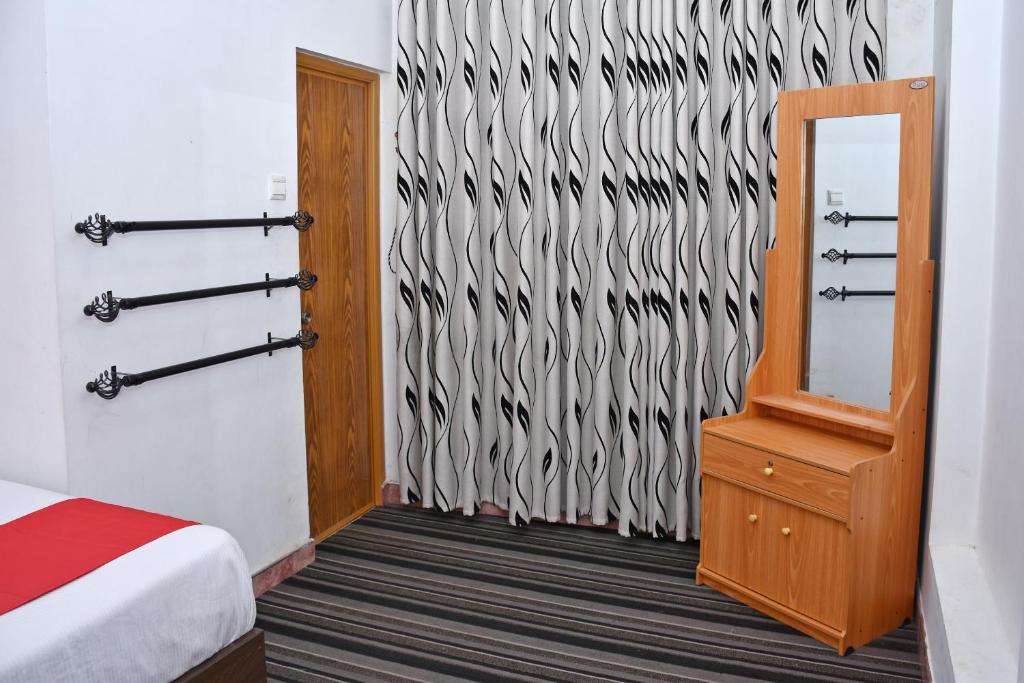 Voodi või voodid majutusasutuse Roshan Guest House toas
