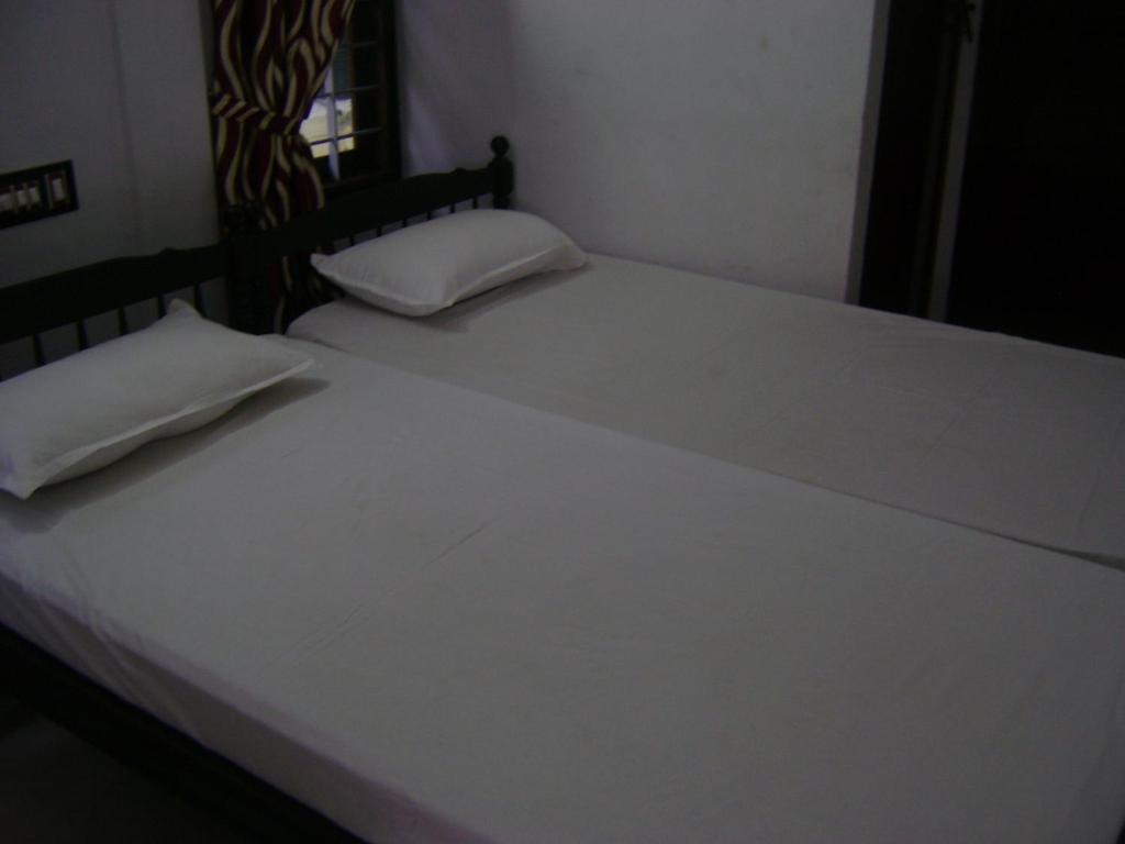 Postel nebo postele na pokoji v ubytování Prems Homestay