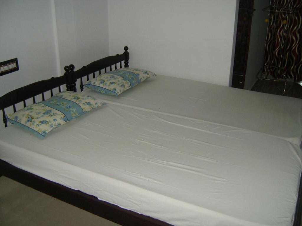 Postel nebo postele na pokoji v ubytování Prems Homestay