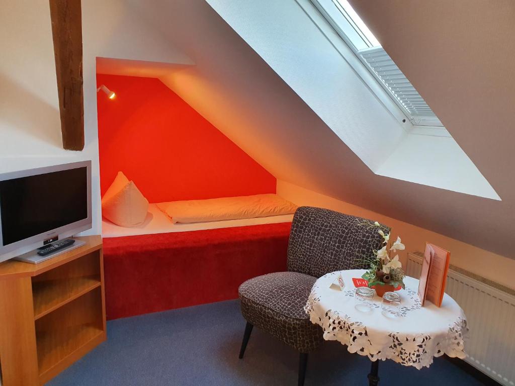 TV a/nebo společenská místnost v ubytování Hotel Schatthaus