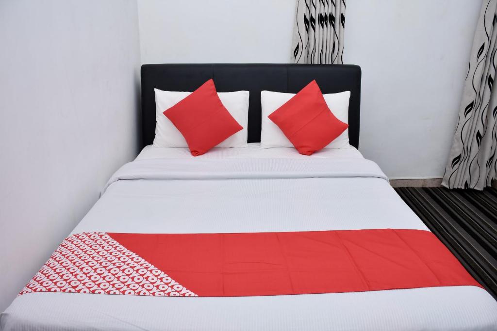 Voodi või voodid majutusasutuse Roshan Guest House toas