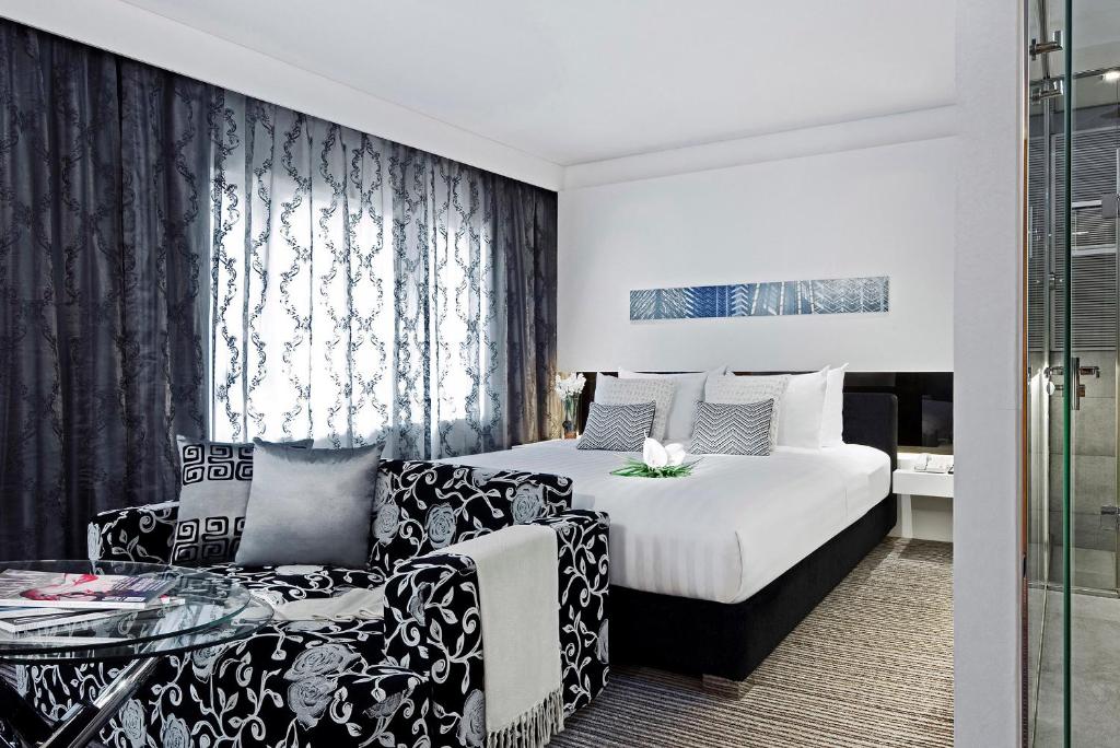 Postel nebo postele na pokoji v ubytování Kew Green Hotel Wanchai Hong Kong