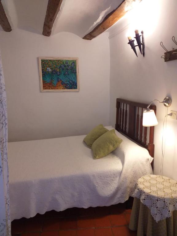 Postel nebo postele na pokoji v ubytování Fonda Del Tozal