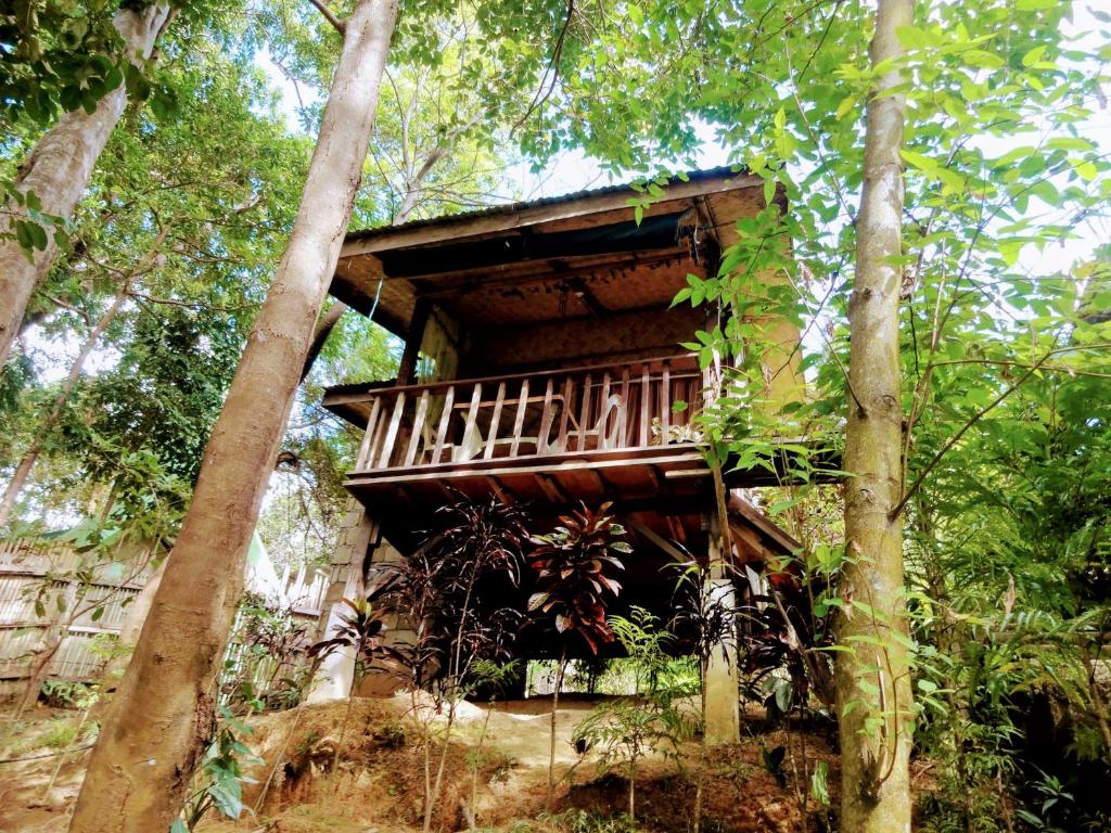 Camp Talusi Hills Overlooking - 花园景观的小屋