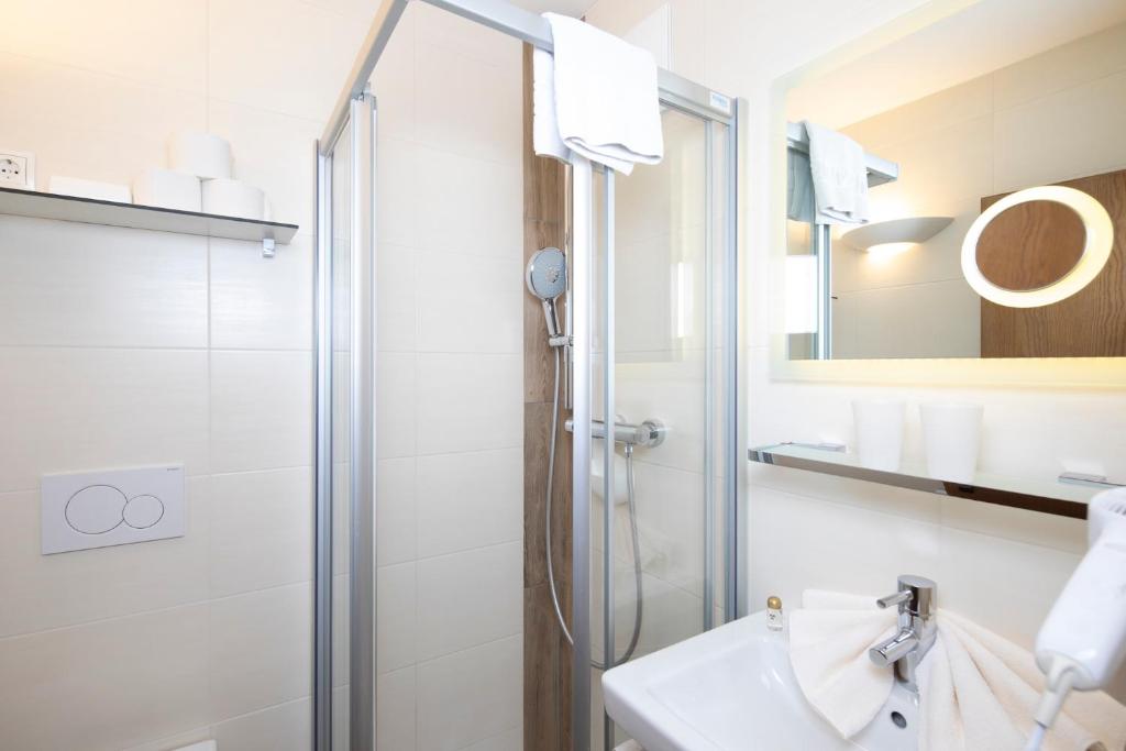 Koupelna v ubytování Angerer Alpine Suiten und Familienappartements Tirol