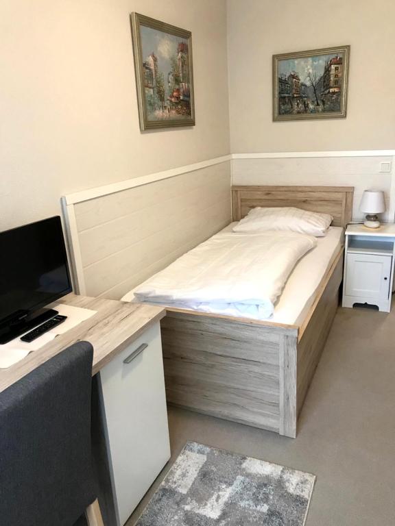 Postel nebo postele na pokoji v ubytování City-Hotel Kaiserhof