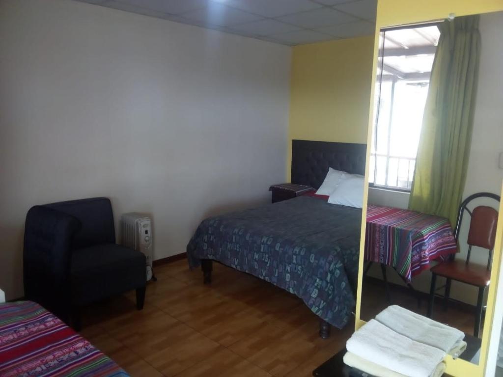 Postel nebo postele na pokoji v ubytování Misti Hostel B&B