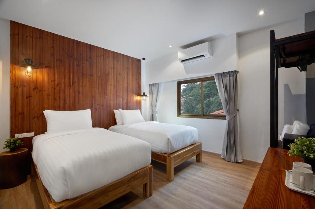 Postel nebo postele na pokoji v ubytování P2 Wood Loft