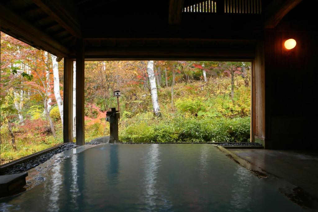 a view from the inside of a water tunnel at Konashi No Yu Sasaya in Matsumoto