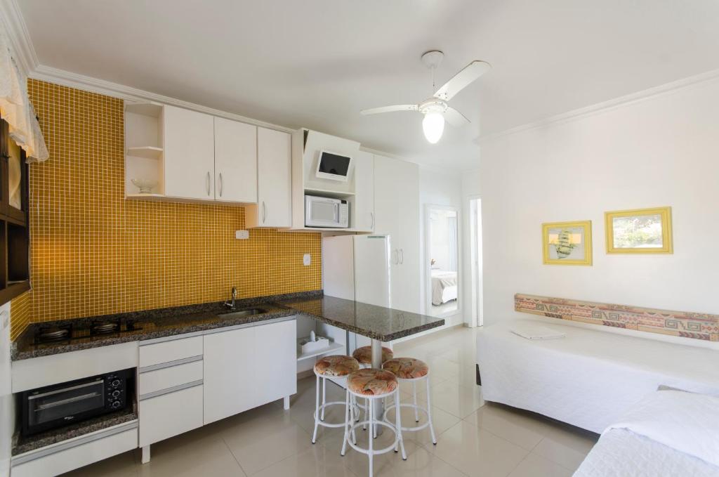 A cozinha ou cozinha compacta de Bombinhas Tourist Apart