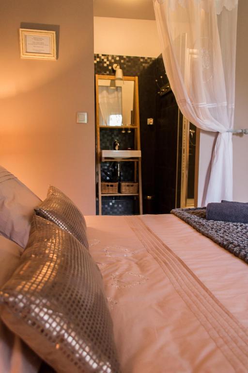Postel nebo postele na pokoji v ubytování Le Brame - Chambres d'Hôtes