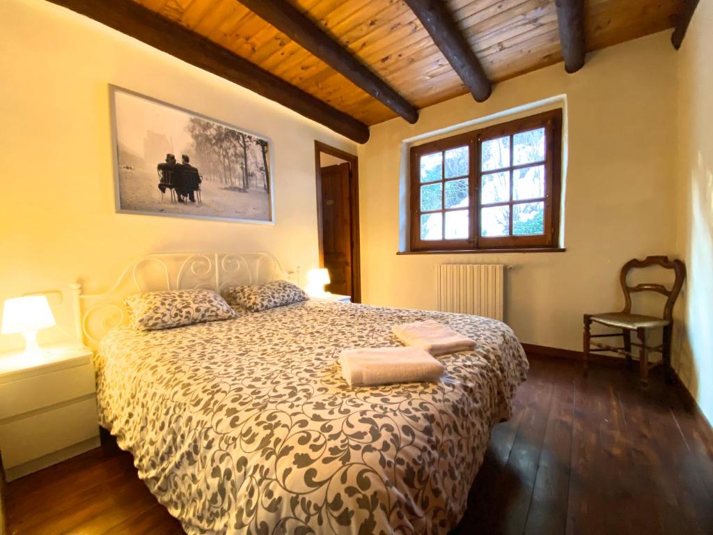 Postel nebo postele na pokoji v ubytování C3 Bordes d'Arinsal, Rustico con Chimenea, Arinsal, Zona Vallnord