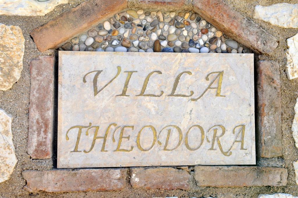 a sign that says vlez melbourne on the ground at Villa Theodora View Apartments Erato in Agios Georgios Pagon