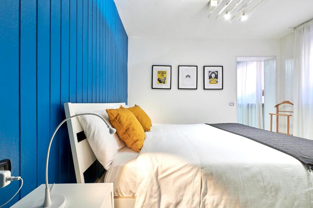 เตียงในห้องที่ Design Suite Cavagna