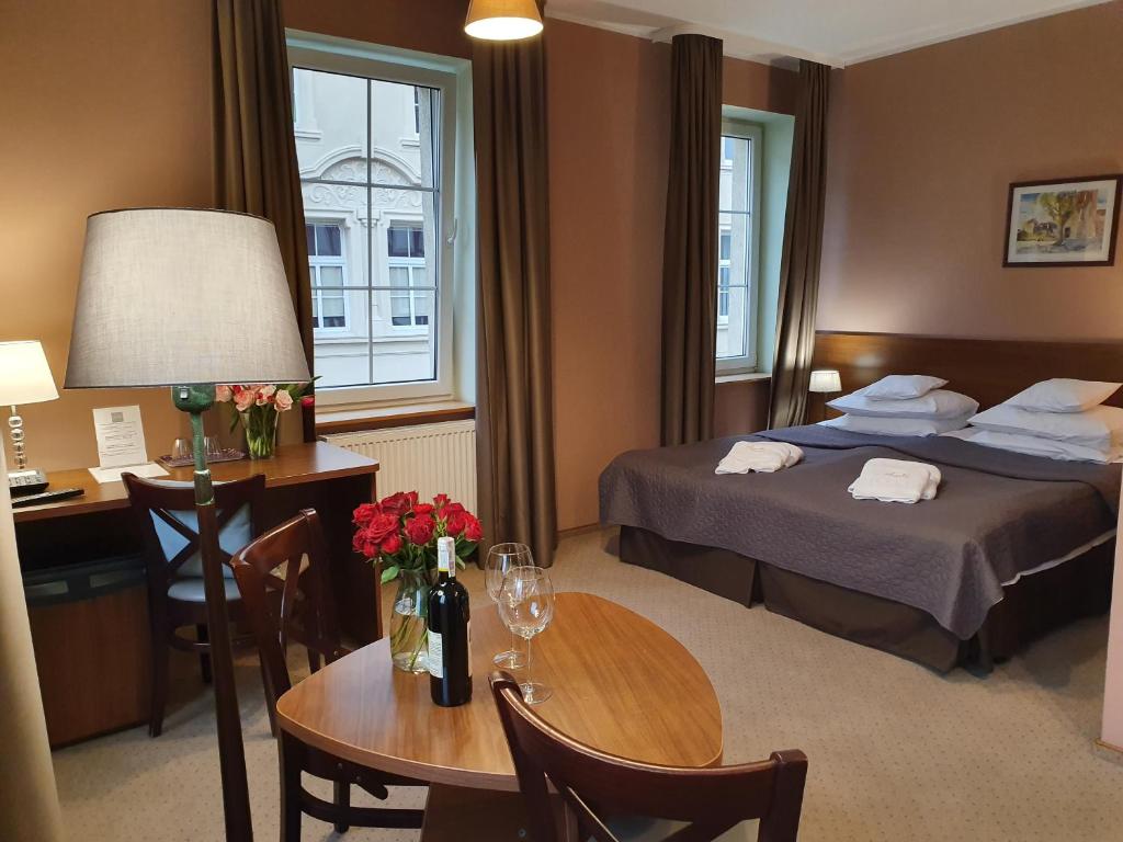 Postel nebo postele na pokoji v ubytování Hotel Siesta