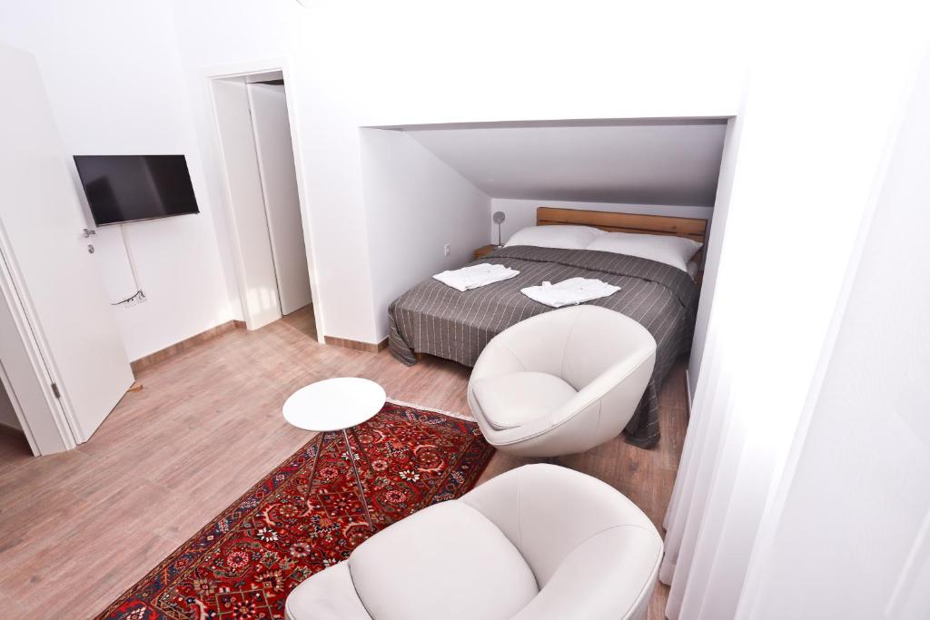 Telewizja i/lub zestaw kina domowego w obiekcie Apartment I&I