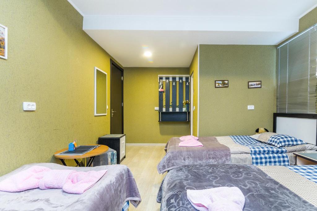 Postel nebo postele na pokoji v ubytování Guest house poligloti