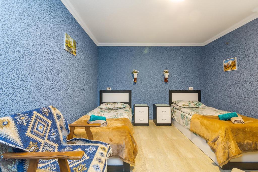 Postel nebo postele na pokoji v ubytování Guest house poligloti