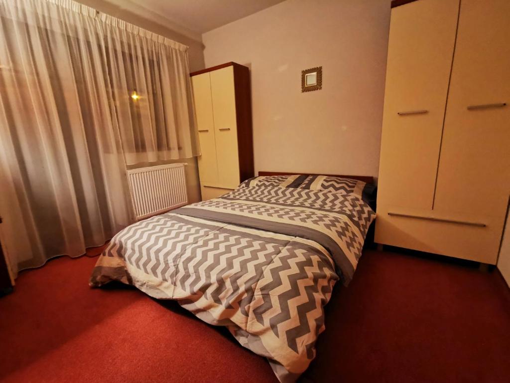 Postel nebo postele na pokoji v ubytování Luxusný Dom Donovaly