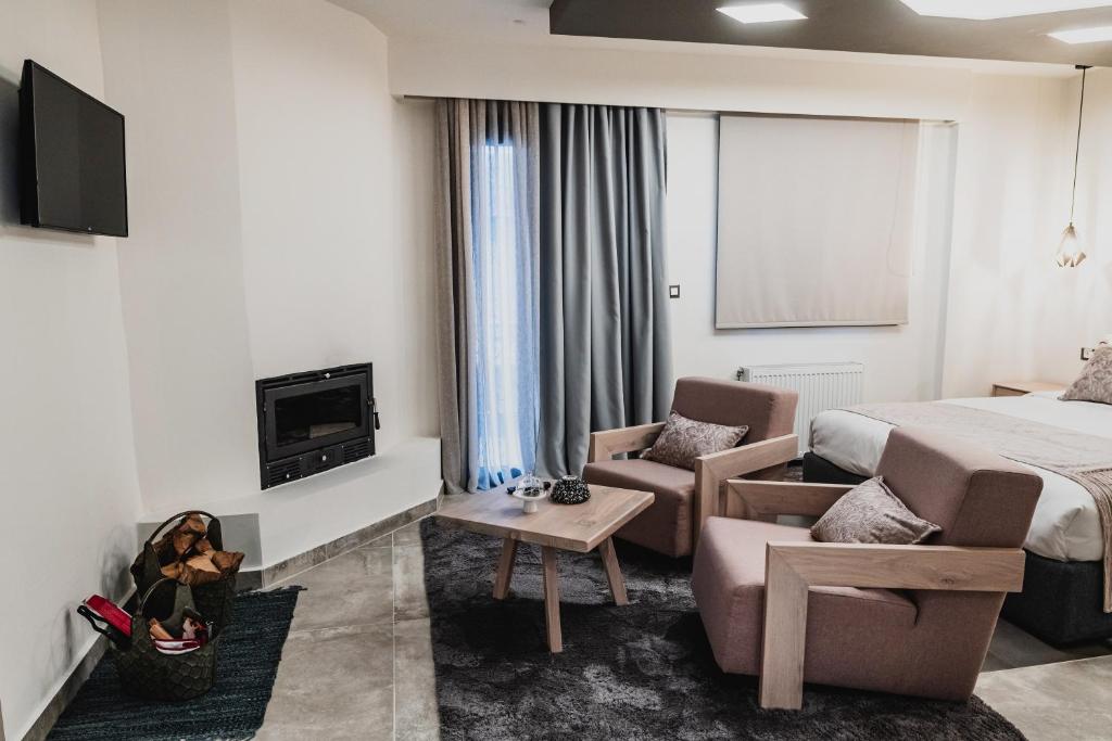 TV a/nebo společenská místnost v ubytování Noelle Mountain Suites