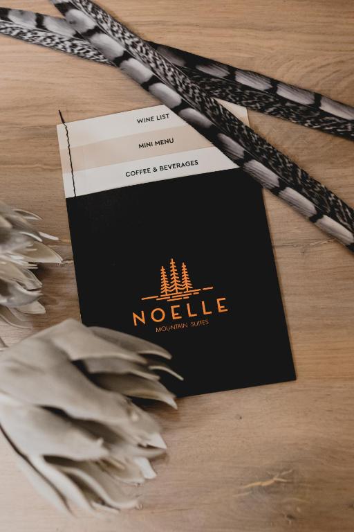 Certifikát, hodnocení, plakát nebo jiný dokument vystavený v ubytování Noelle Mountain Suites