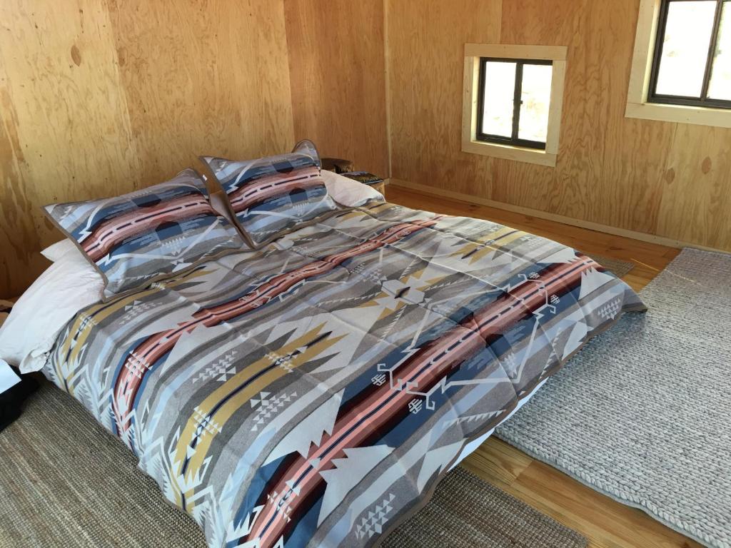 Postel nebo postele na pokoji v ubytování Shash Dine' EcoRetreat
