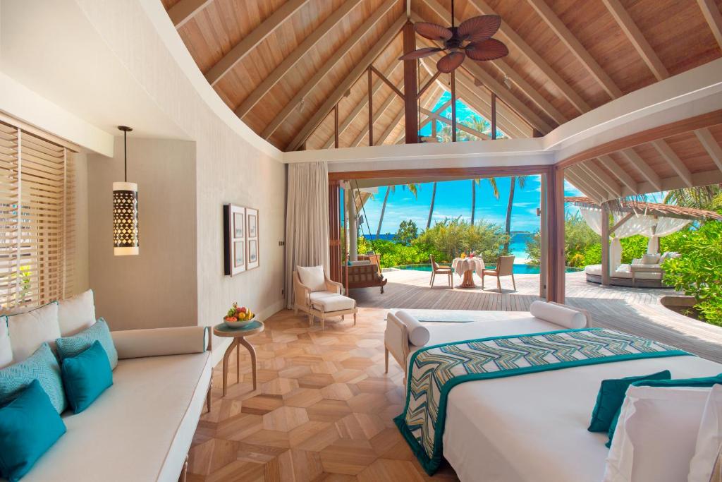 Postel nebo postele na pokoji v ubytování Milaidhoo Maldives