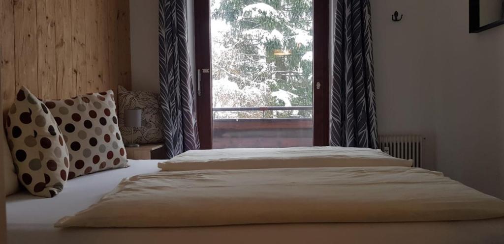 Posteľ alebo postele v izbe v ubytovaní Casa Alpina Relax - Pool&Sauna - include Jokercard