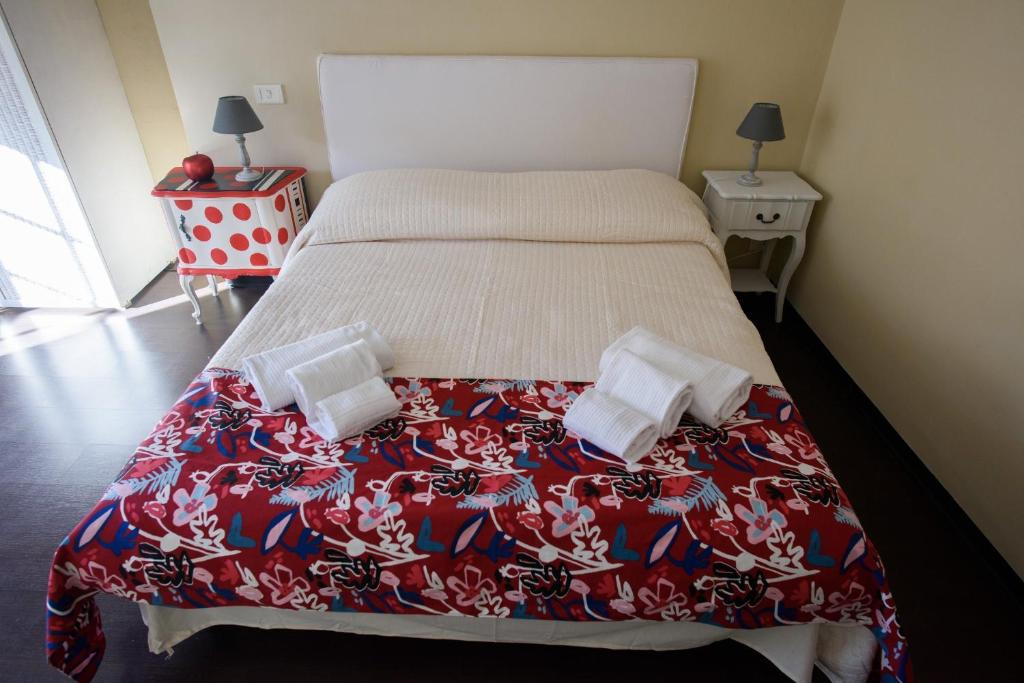 Postel nebo postele na pokoji v ubytování B&B Piccoli Leoni