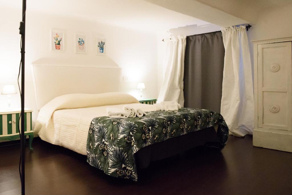 Postel nebo postele na pokoji v ubytování B&B Piccoli Leoni