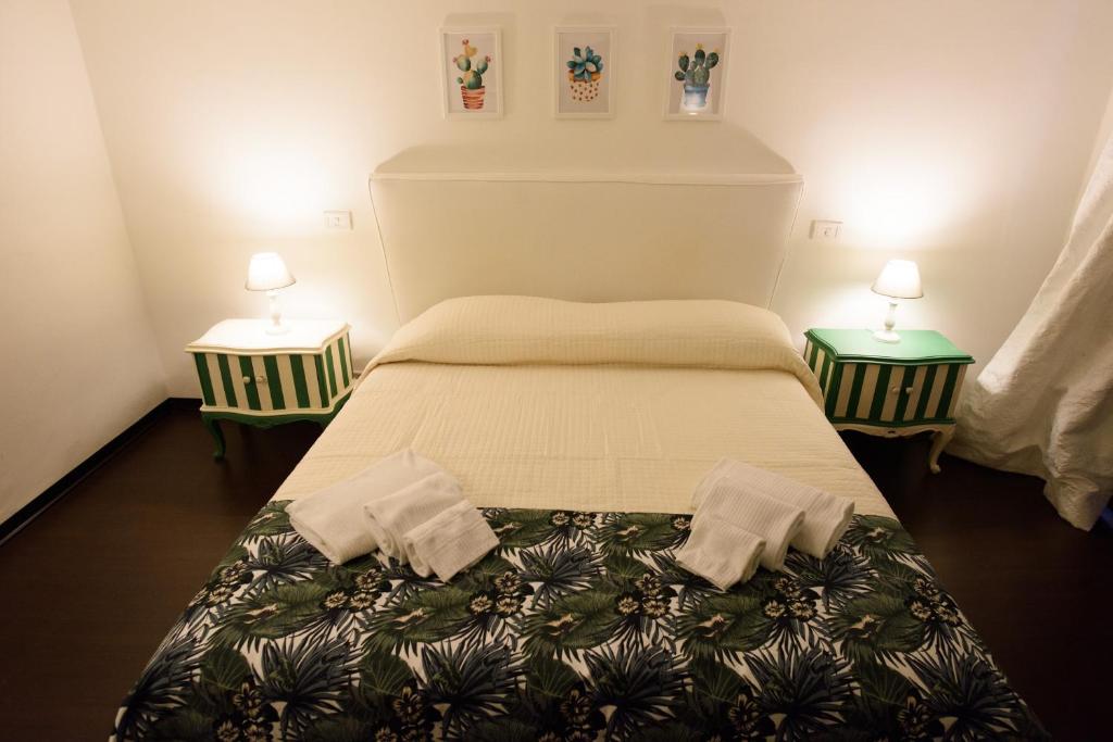 Postel nebo postele na pokoji v ubytování B&B Piccoli Leoni
