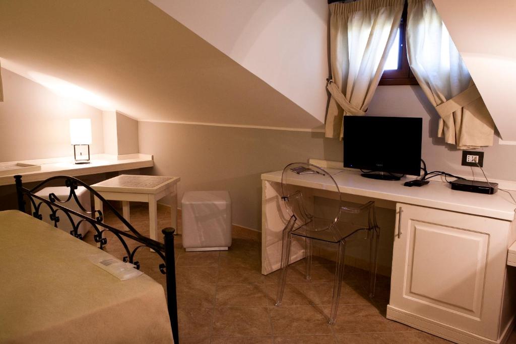 TV a/nebo společenská místnost v ubytování B&B 7Cento Ulivi