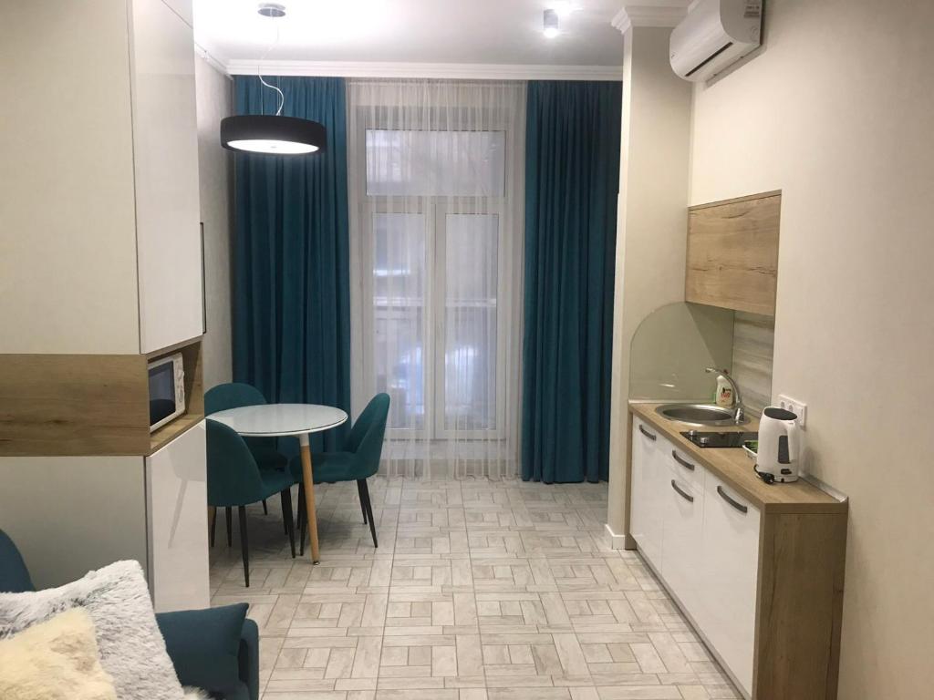 Kuchyň nebo kuchyňský kout v ubytování Lviv Apartments