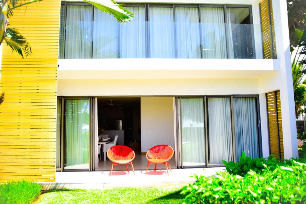 Posezení v ubytování Cap Ouest Beachfront Residences
