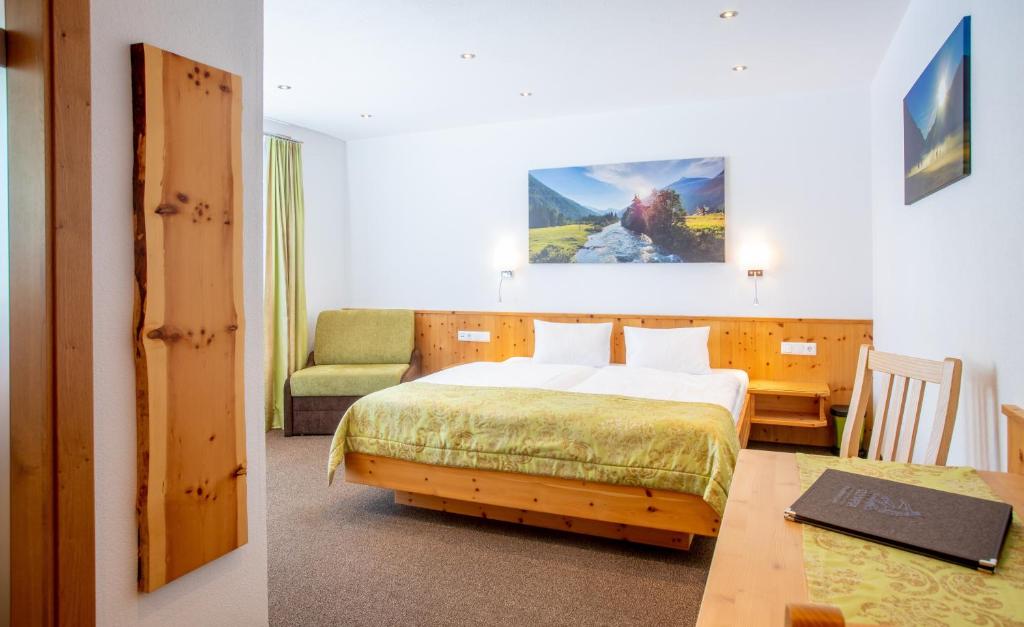 Postel nebo postele na pokoji v ubytování OLYMPIA Privathotel Garni