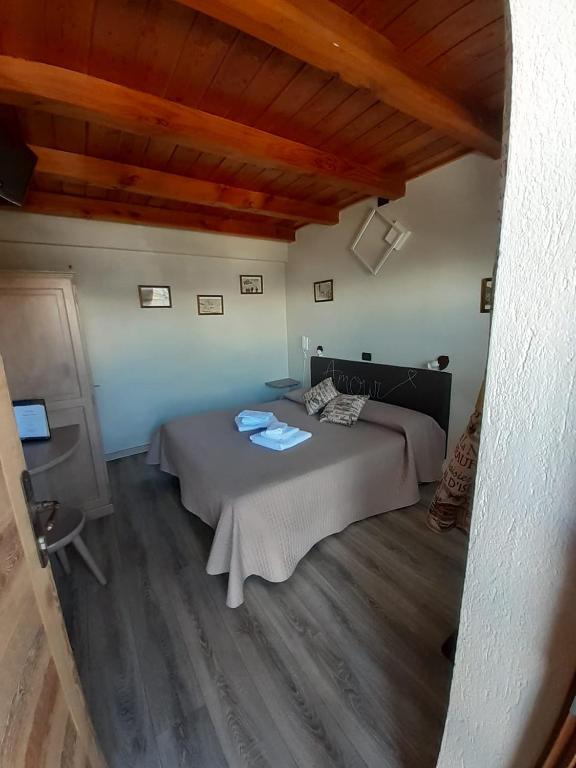 Postel nebo postele na pokoji v ubytování Hotel Chacaril