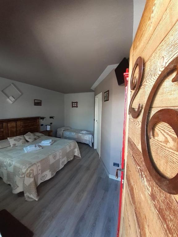 Postel nebo postele na pokoji v ubytování Hotel Chacaril