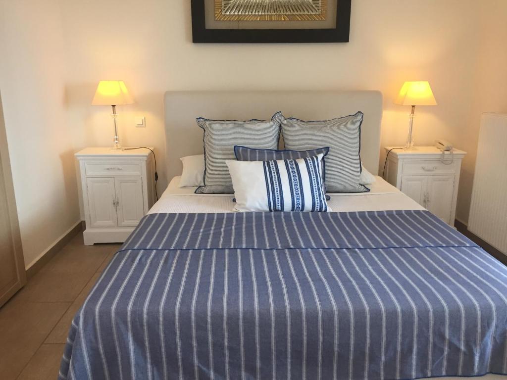 Кровать или кровати в номере Elaion mini suites