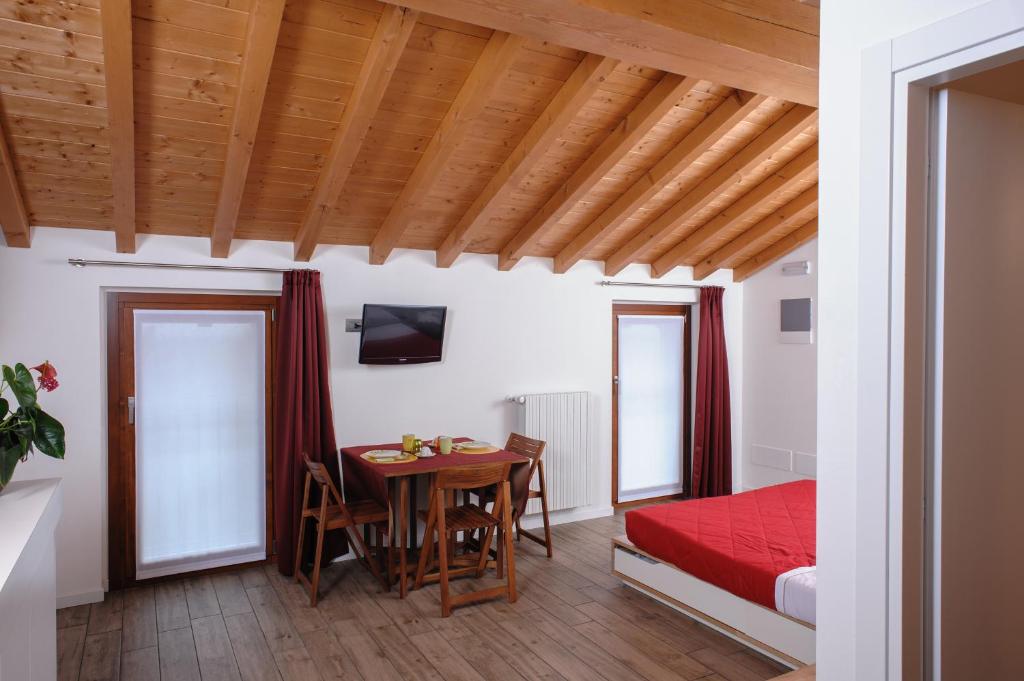 Łóżko lub łóżka w pokoju w obiekcie Tenuta Le Sorgive Agriturismo