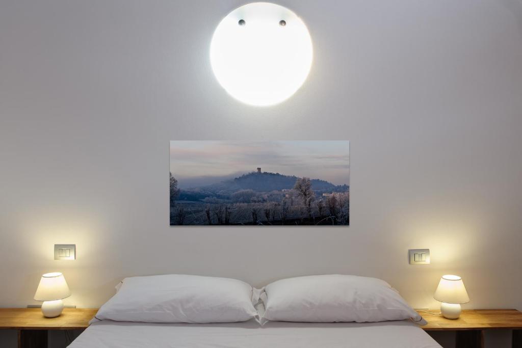 Łóżko lub łóżka w pokoju w obiekcie Tenuta Le Sorgive Agriturismo