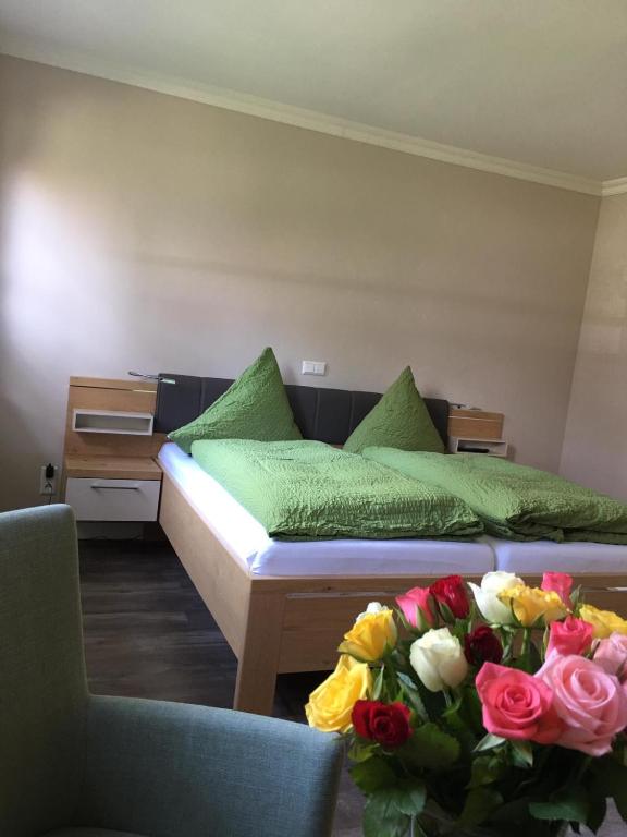Postel nebo postele na pokoji v ubytování Haus am Parc