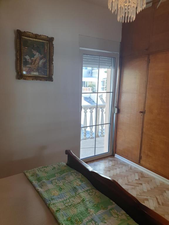 Lova arba lovos apgyvendinimo įstaigoje Apartments Zenit